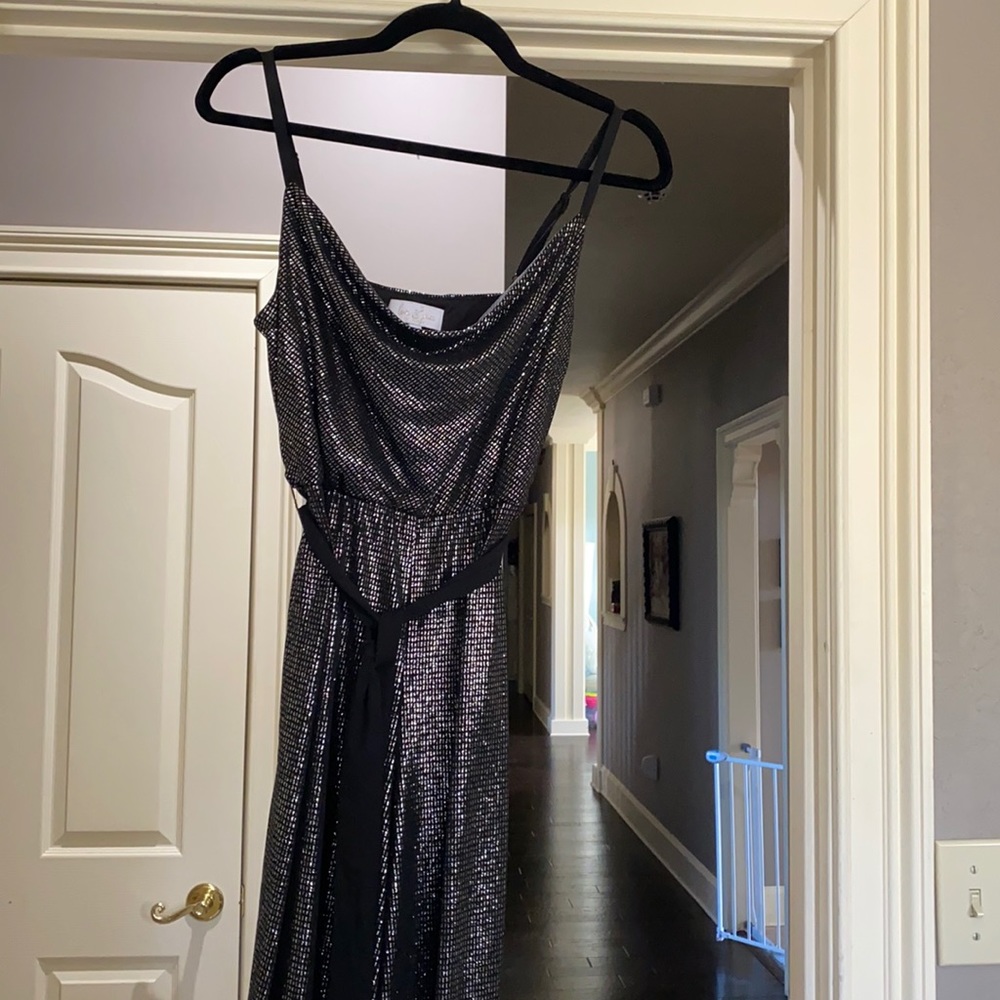 New without tags.  Never wore.  Size small sparkly romper